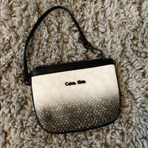 Calvin Klein black and white ombré wristlet
